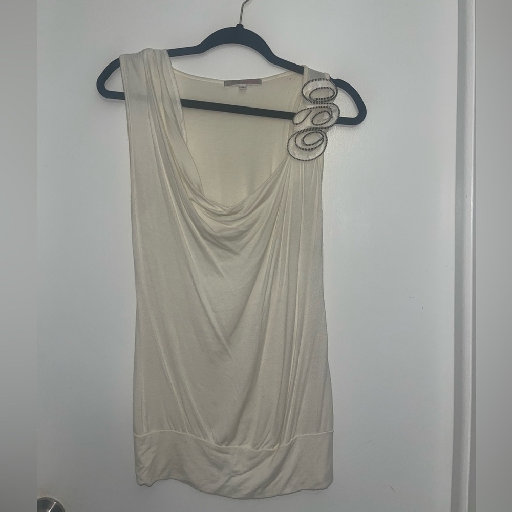 Size Medium, light cream color